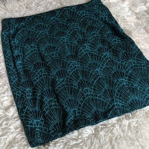 Turquoise flapper-like skirt